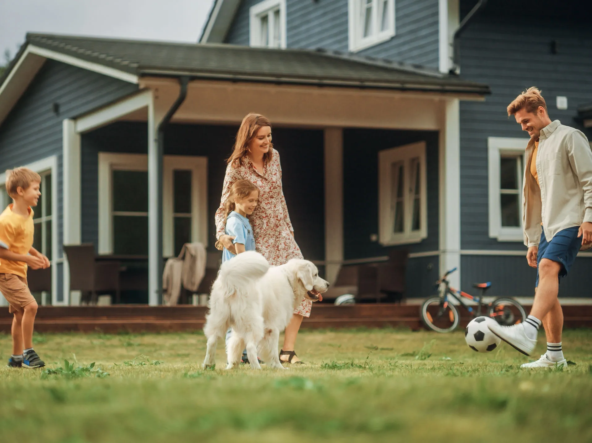 Family in front of their home